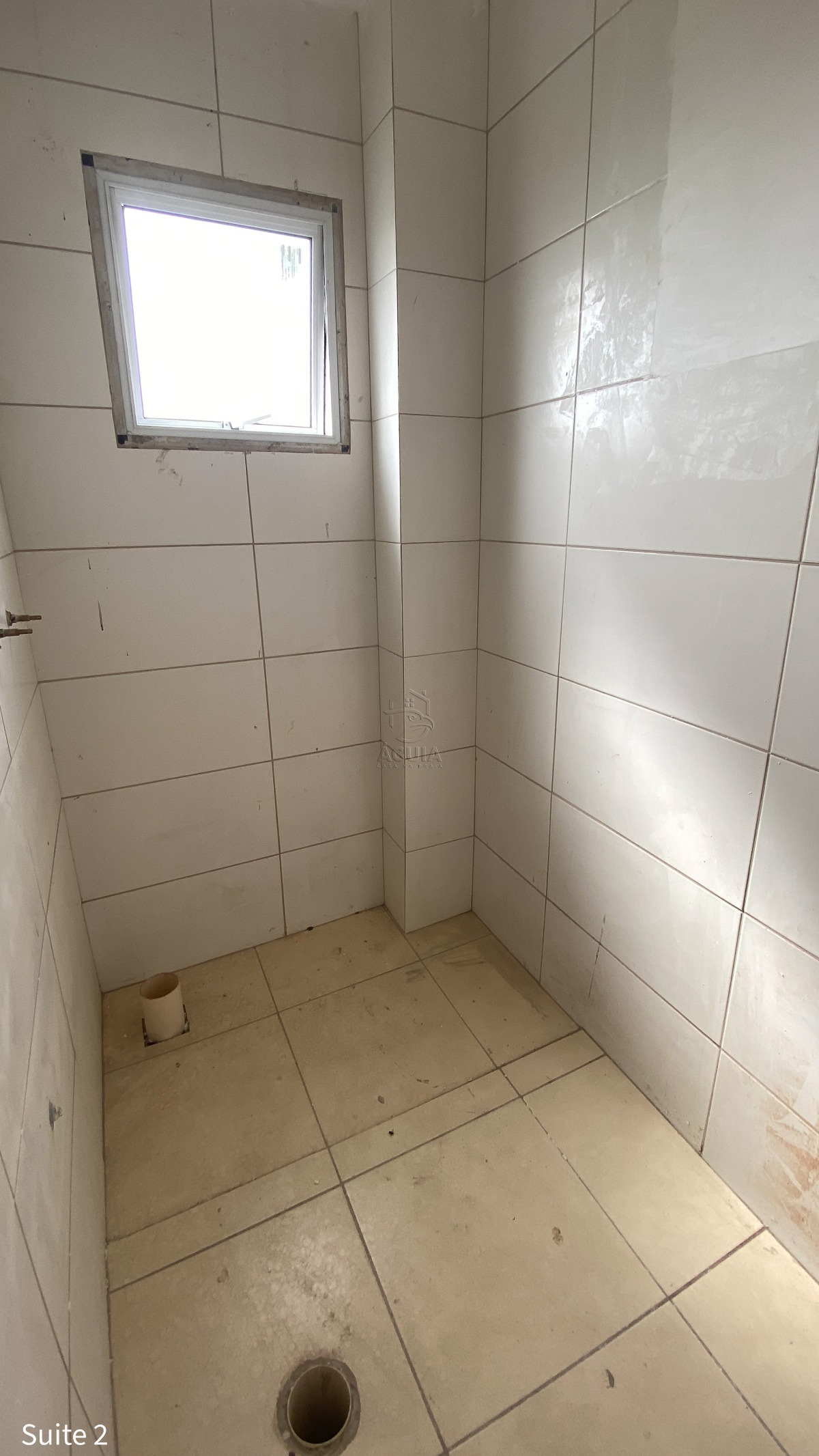 Apartamento à venda na Barra da Lagoa em Ubatuba/SP com vista para o mar, 3 suítes, varanda gourmet e área de lazer completa.