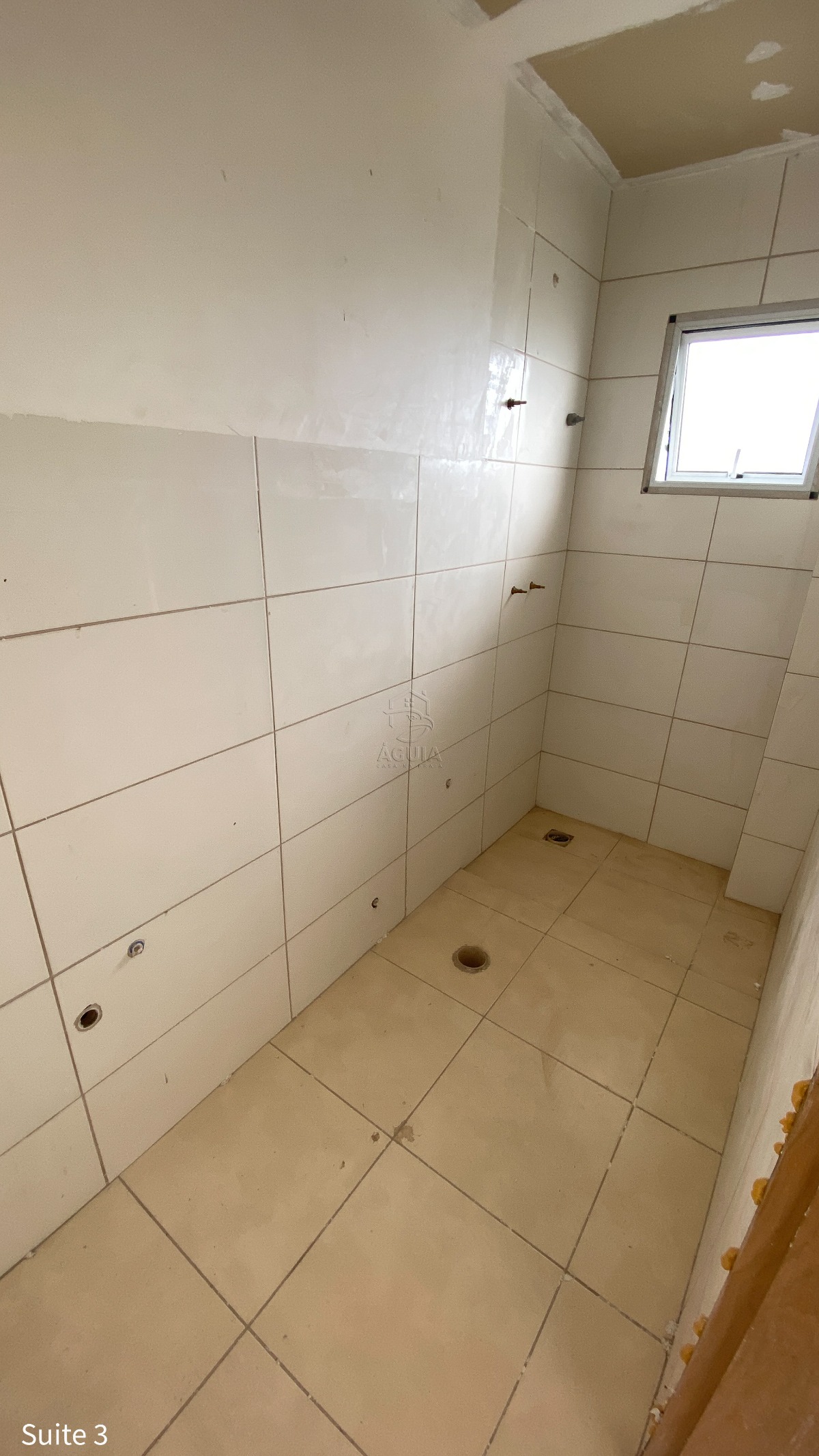 Apartamento à venda na Barra da Lagoa em Ubatuba/SP com vista para o mar, 3 suítes, varanda gourmet e área de lazer completa.