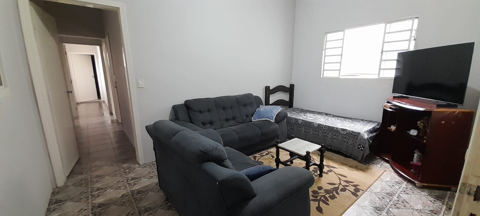 Casa à venda no Perequê-Açu em Ubatuba/SP, mobiliada e próxima à praia, com varanda gourmet, 4 dormitórios e garagem coberta.